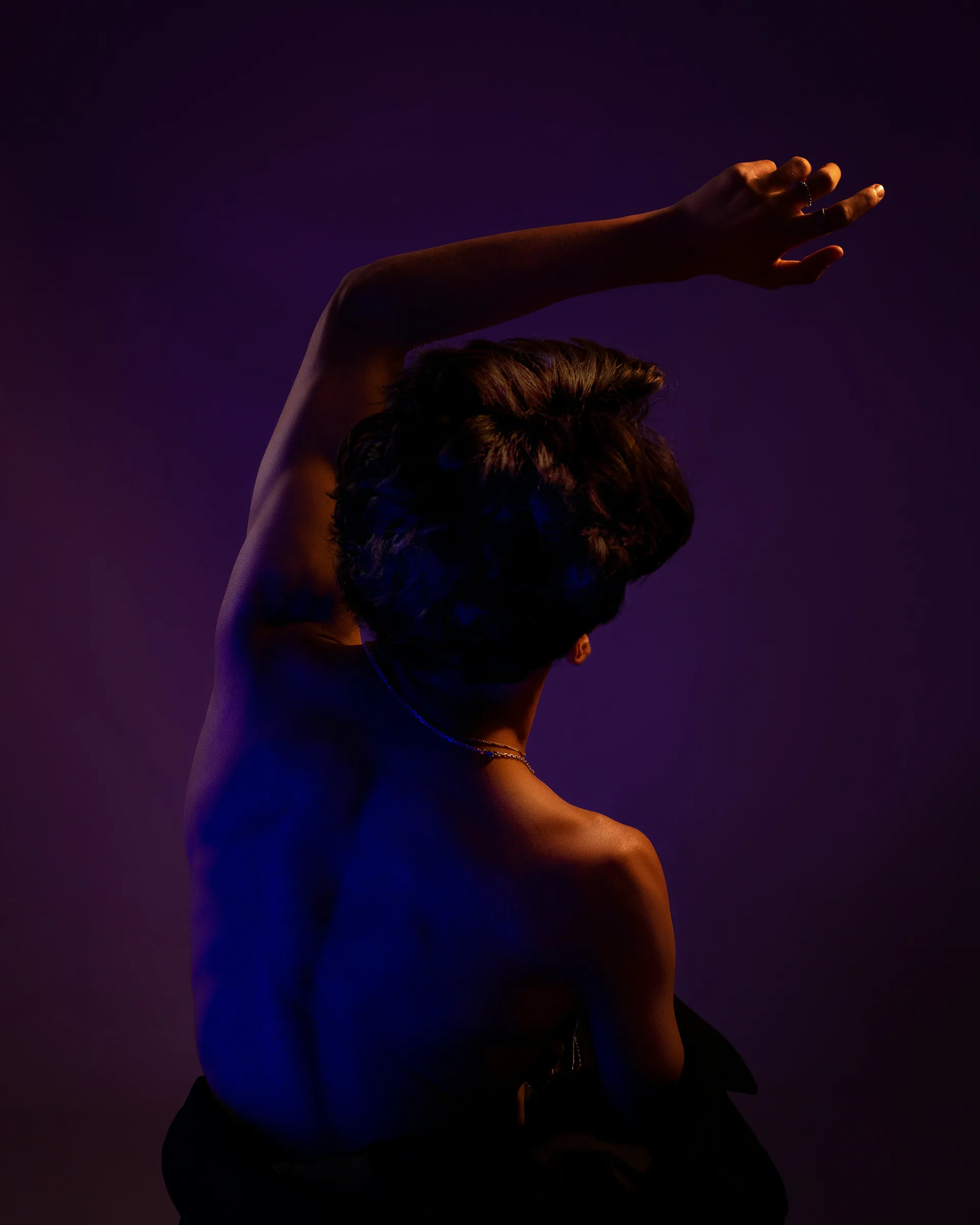 A performer under stage light